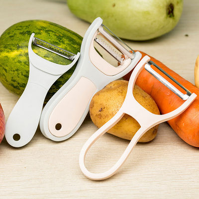 Vielseitiges Metallschälmesser mit Handgrater und rutschfester Handgriffe