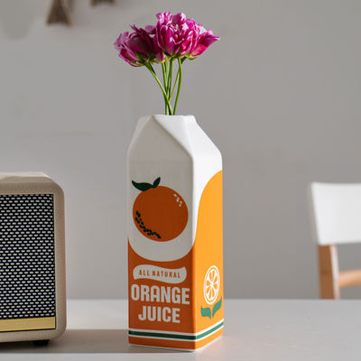 Kleine moderne keramische hydroponische Tischvase in orange Ideal für Zuhause und Restaurant