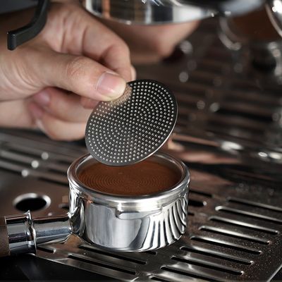 Moderne 51mm Edelstahl-Kaffee Puck-Bildschirm für professionelle Baristas