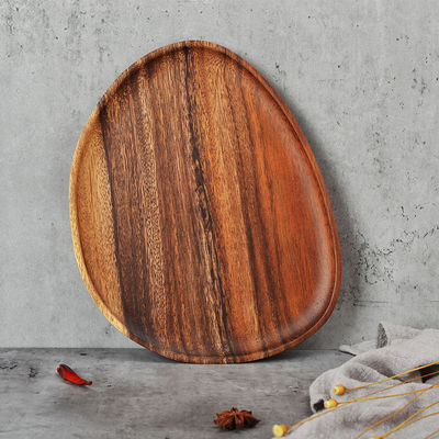 Bieten Sie nachhaltige natürliche Holzgeschirr und Servierteller mit traditionellem Design an