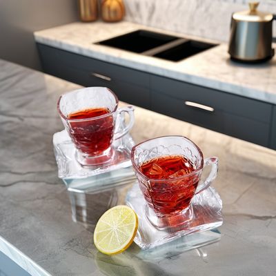 Klassisches Design Kaffee-Tee-Sets Transparente Glas-Tasse-Teller-Set mit Mustergriffe