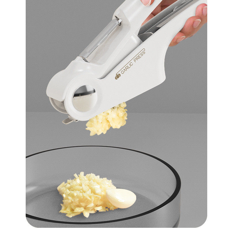 Multifunktionale Knoblauch- und Knoblauchschneidermaschine aus Edelstahl 4 in 1 mit Dosenöffner